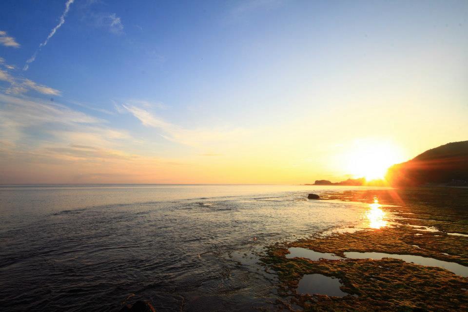 從牛頭山頭上露出日出